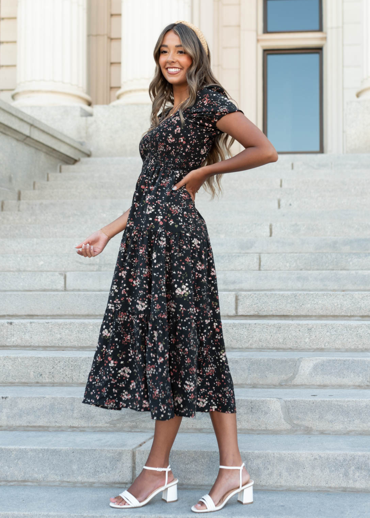 Side view of the black floral tiered dress