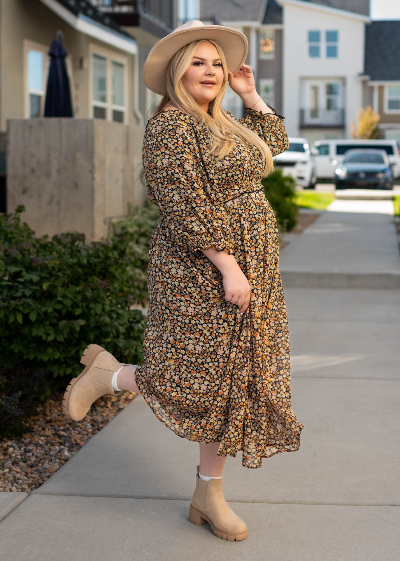 Plus size black floral tiered dress