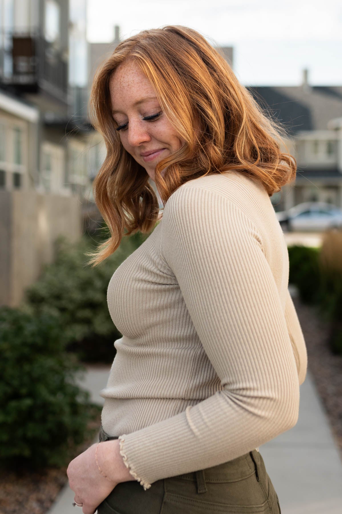 Side view of a latte sweater