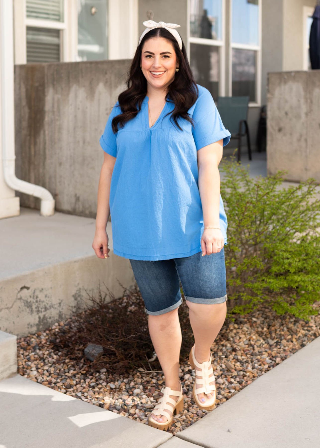 Blue v-neck top with short sleeves