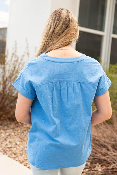Back view of the blue v-neck top