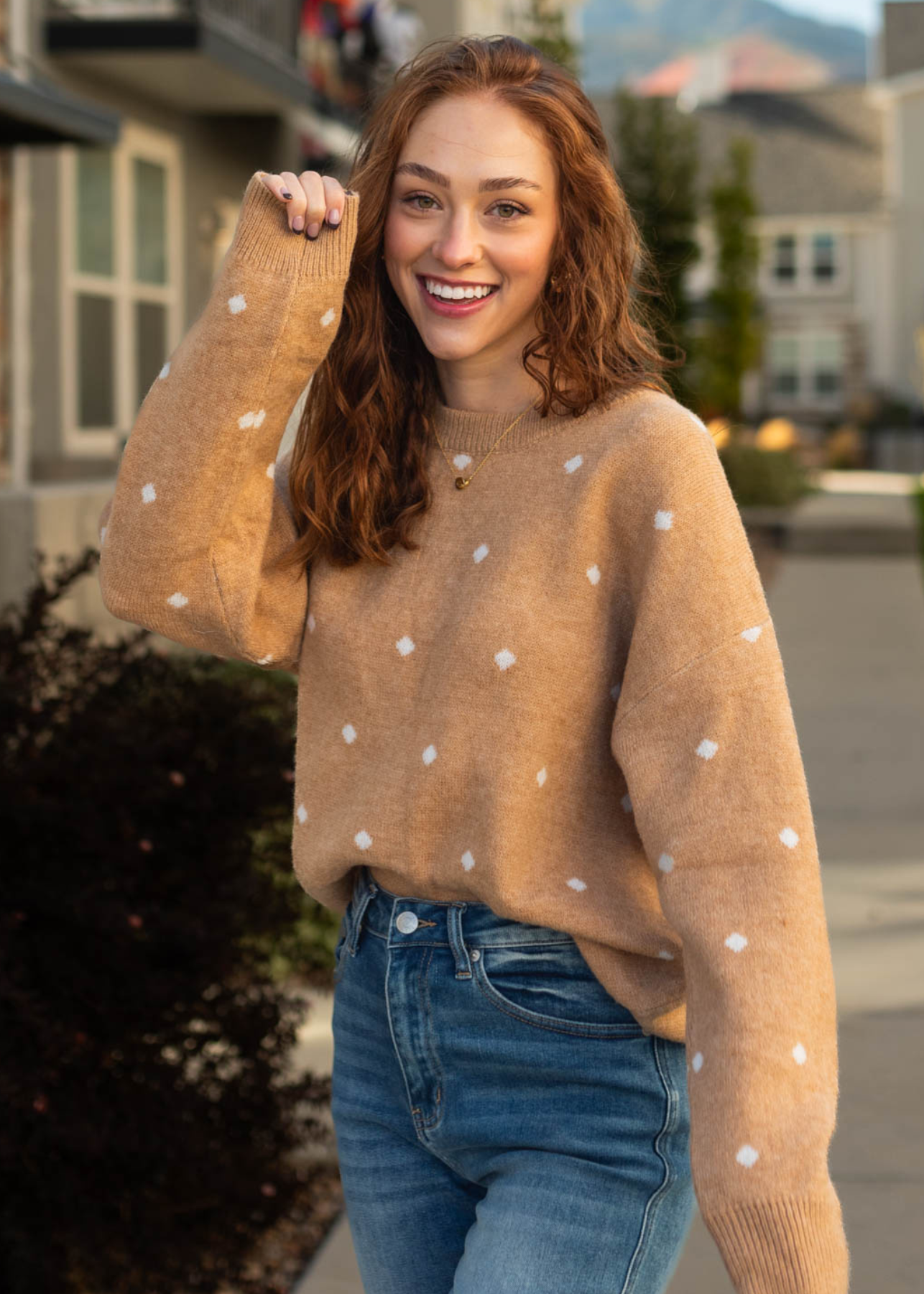 Camel sweater with long sleeves and white polka dots