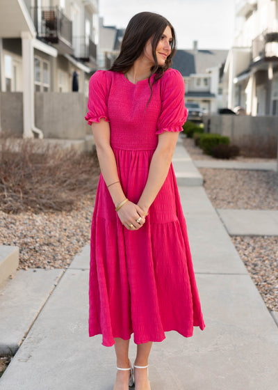 Smocked bodice on the hot pink tiered dress