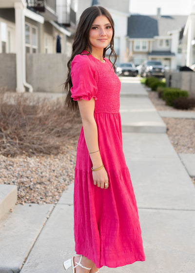 Side view of the hot pink tiered dress