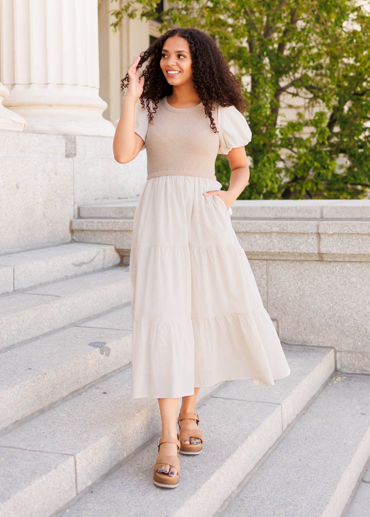 Tan rib knit dress with white skirt and sleeves