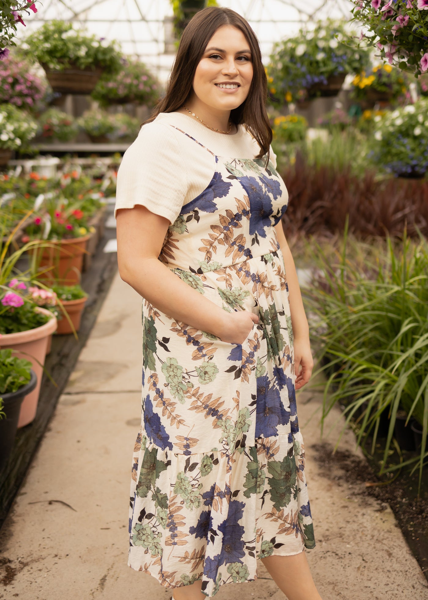 Side view of a cream floral dress
