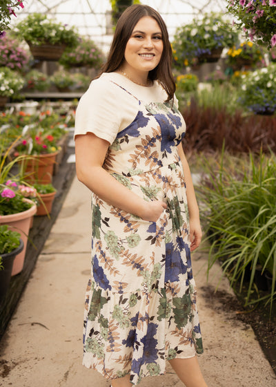 Side view of a cream floral dress