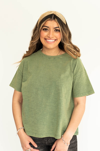 Bright sage top with short sleeves.