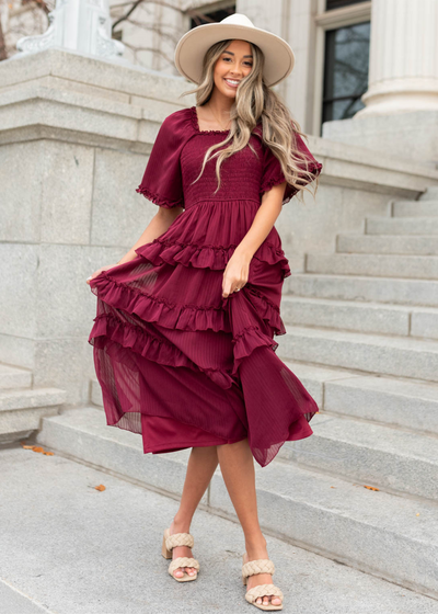 Burgundy dress with tiered dress with smocked bodice