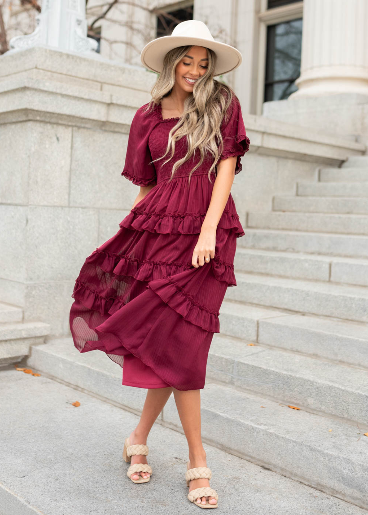 Burgundy tiered dress with ruffles on skirt and short sleeves