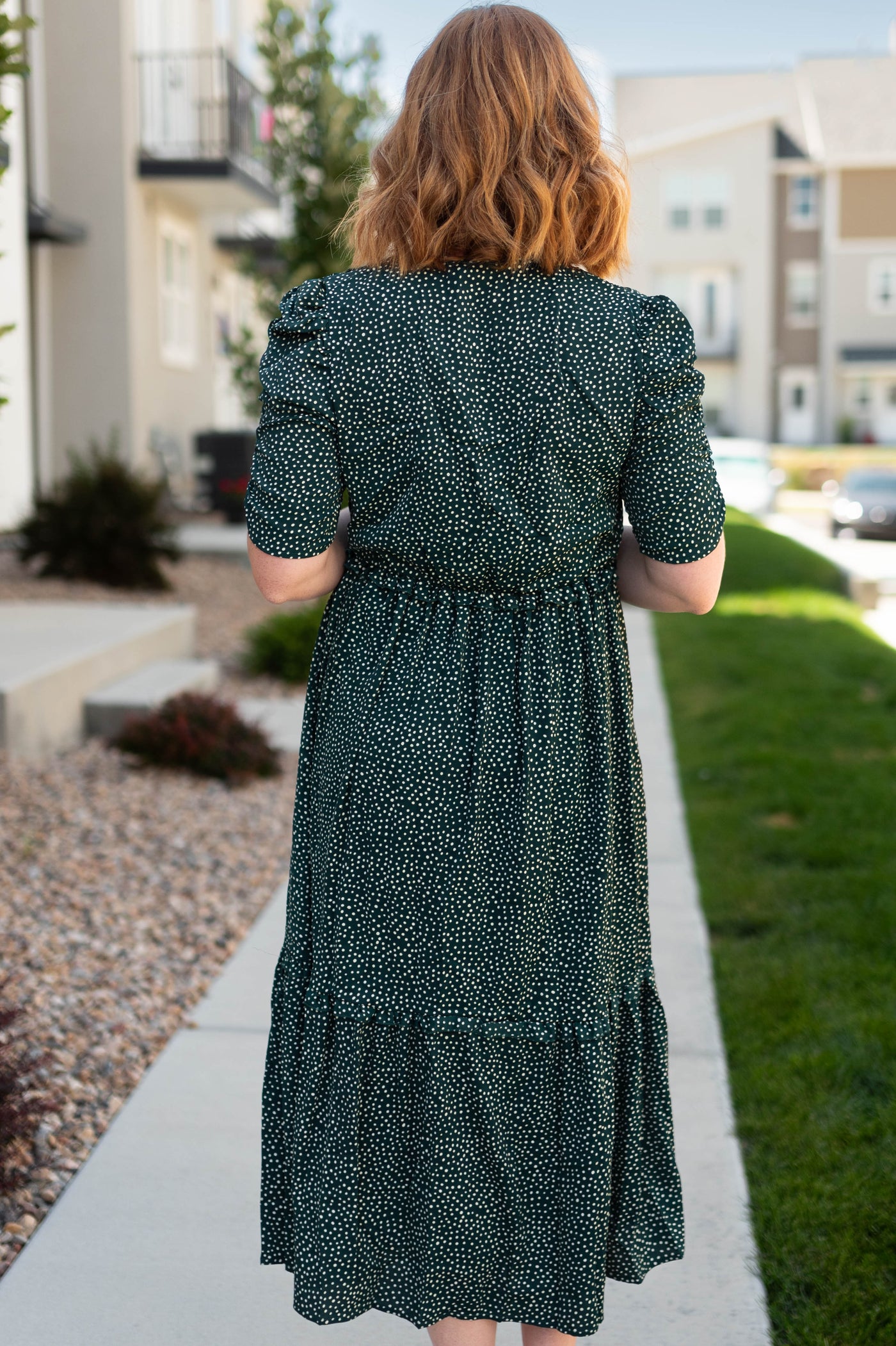 Back view of a hunter green dress