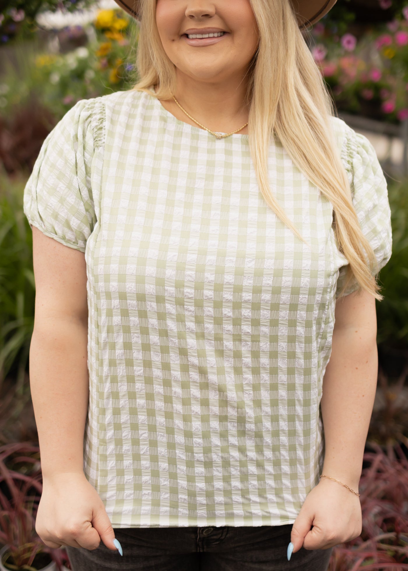 Plus size sage top with short sleeves and checkered print