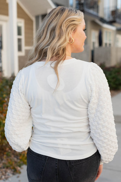 Back view of a ivory top
