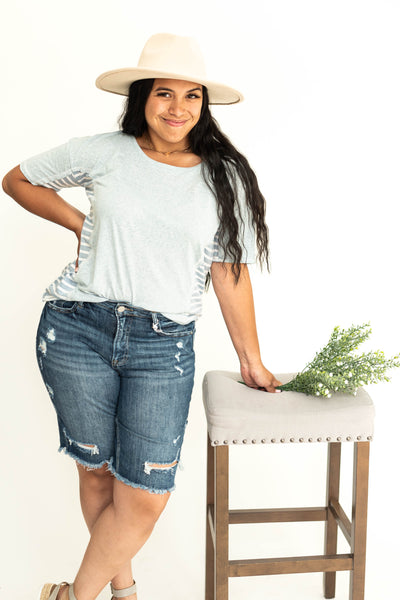 Short sleeve soft blue top.