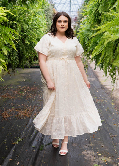 Plus size cream embroidered floral dress with a v-neck
