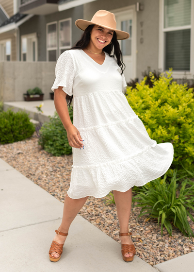Short sleeve v-neck white dress with tiered skirt