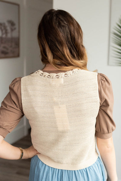 Back view of the oatmeal crochet vest