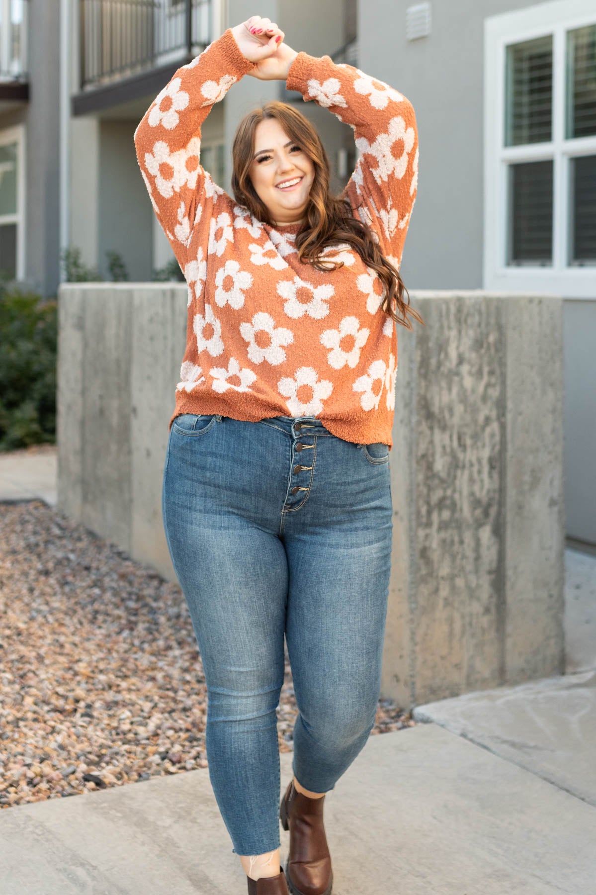 Plus size caramel sweater with long sleeves and daisies