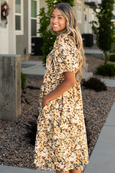 Side view of a brown floral dress