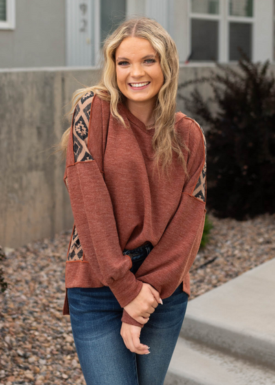 Rust top with long sleeves