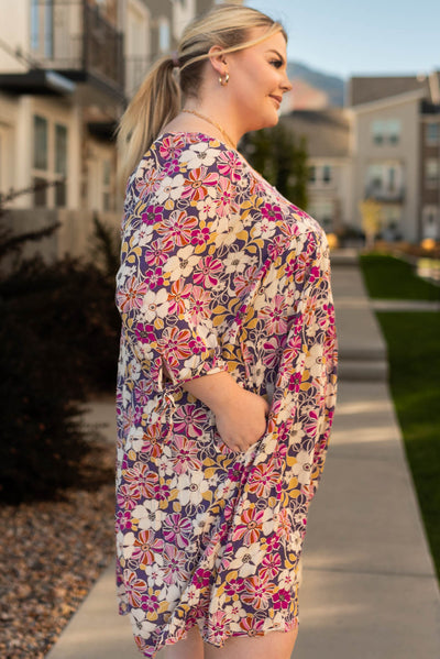 Side view of a violet floral dress