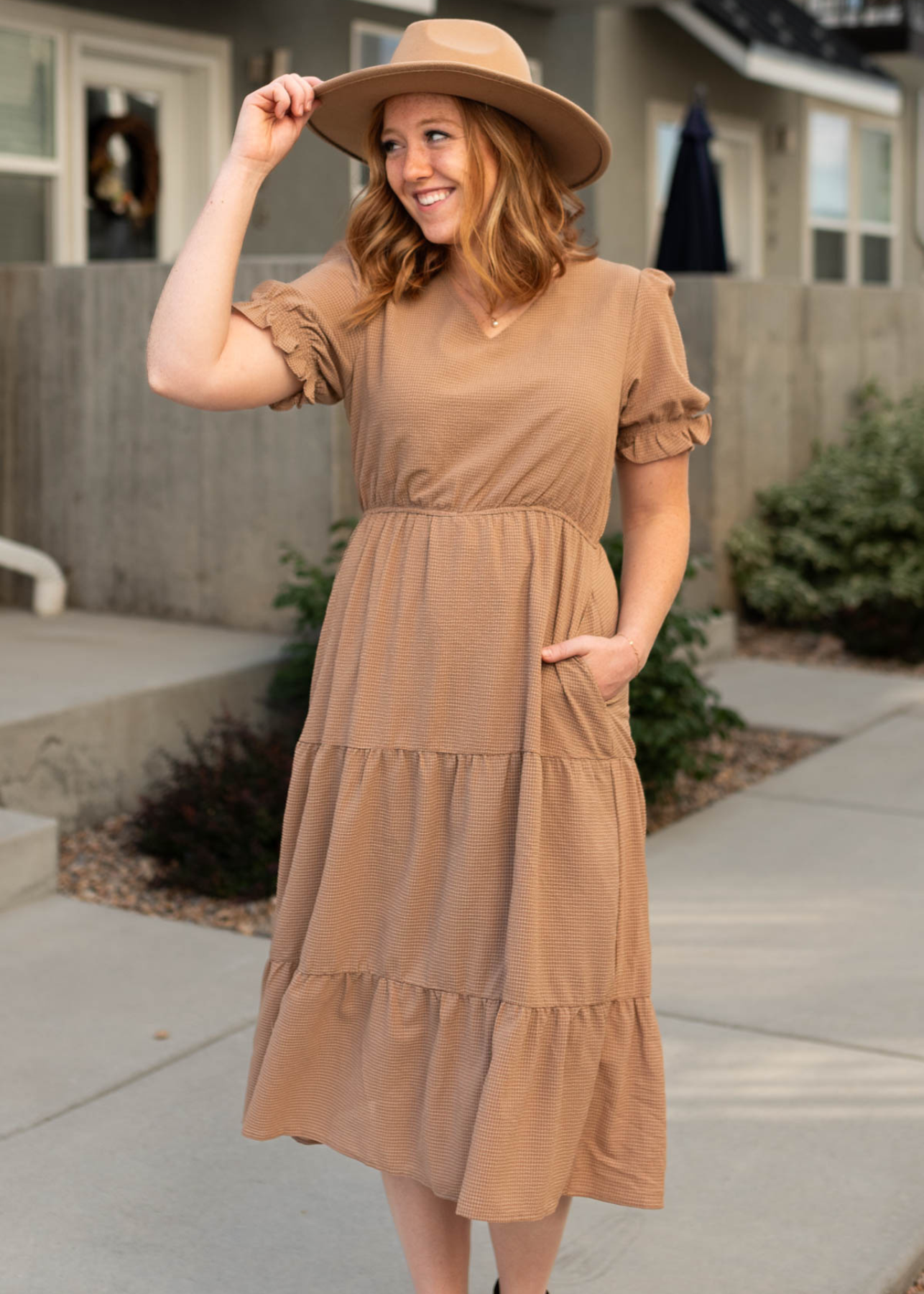 Short sleeve brown dress with tiered skirt and pockets