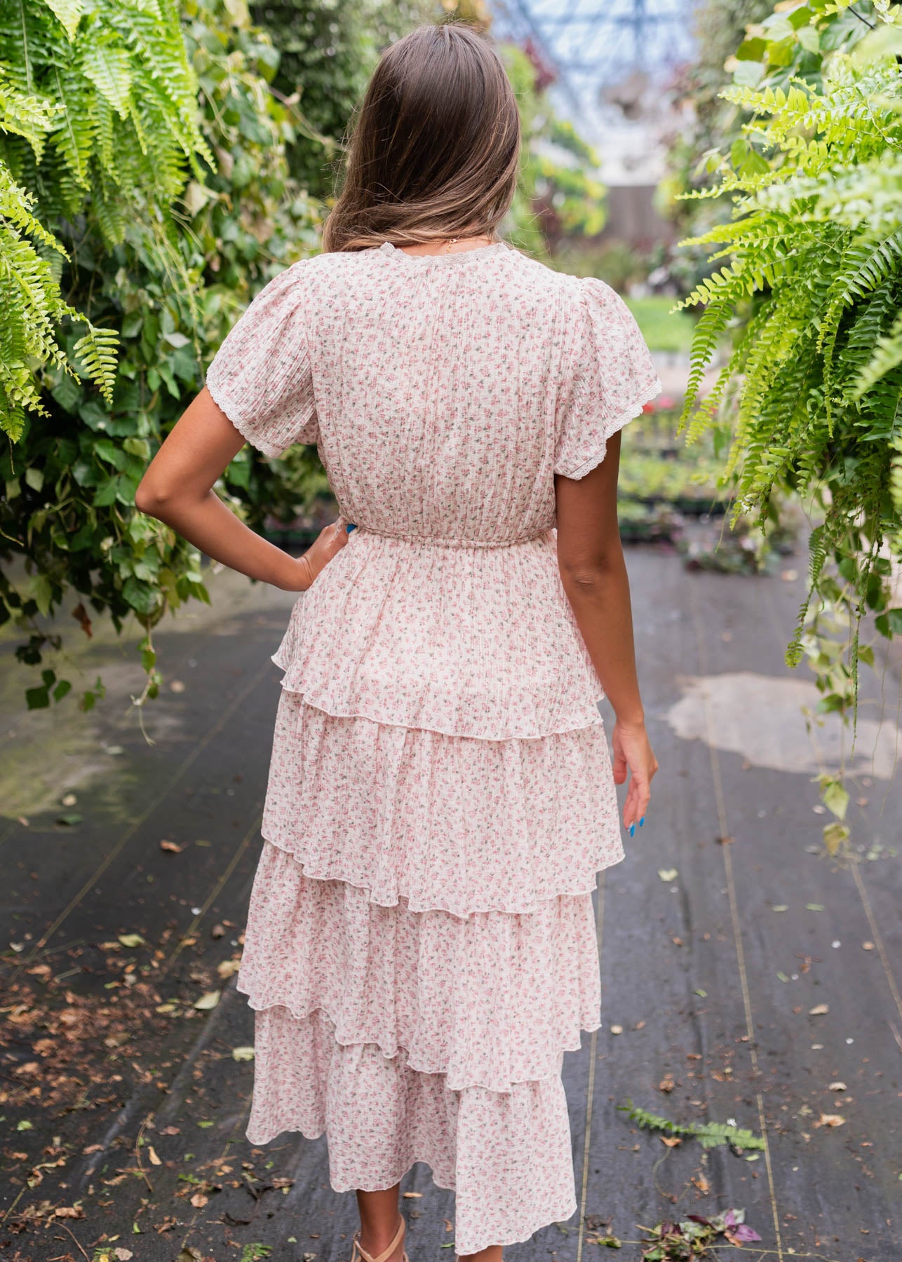 Back view of the blush rose tiered ruffle dress