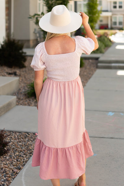 Back view of a pink dress