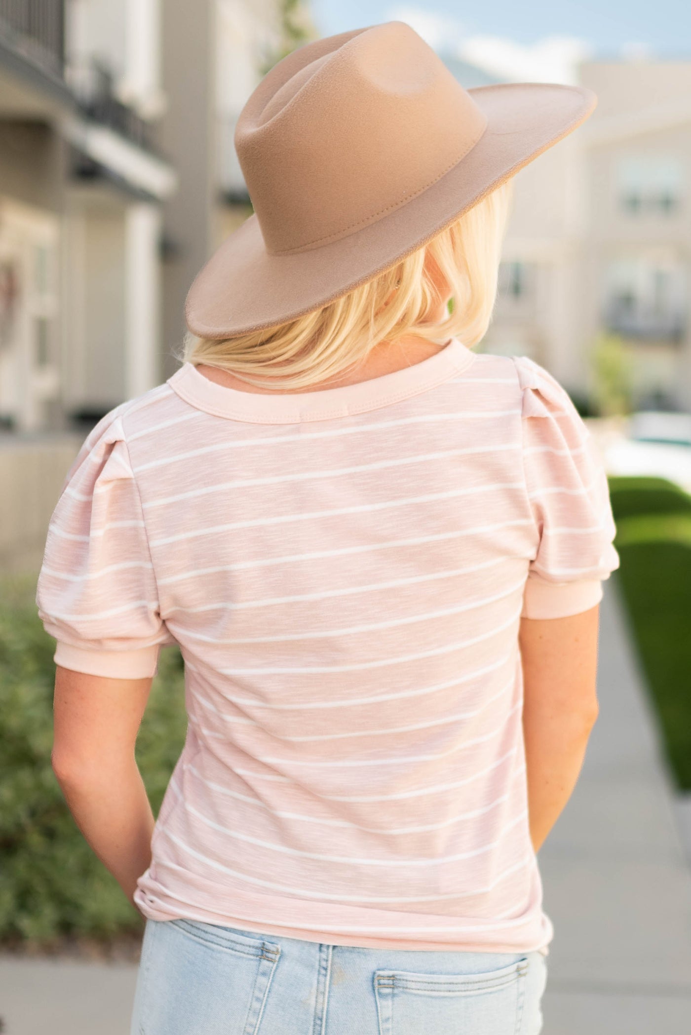 Back view of a pink stripe top