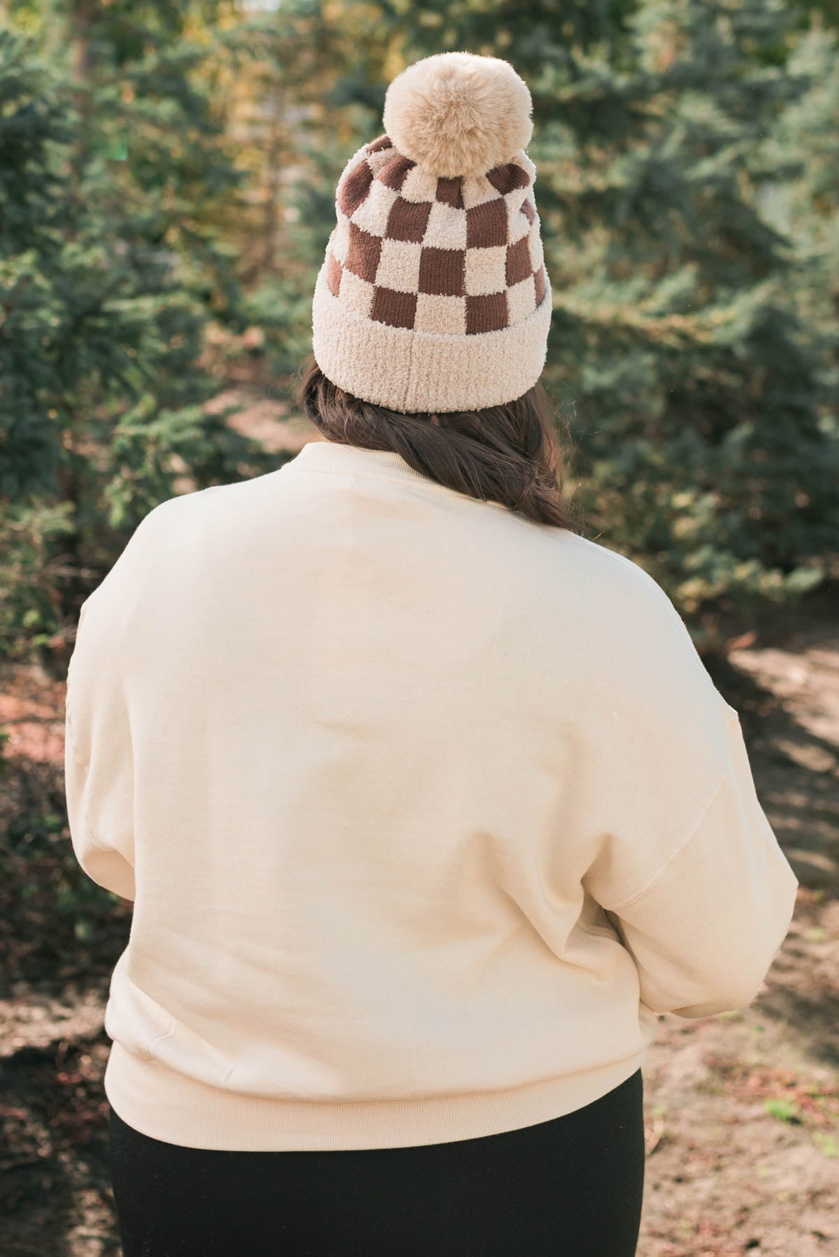 Back view of a plus size cream fleece sweatshirt