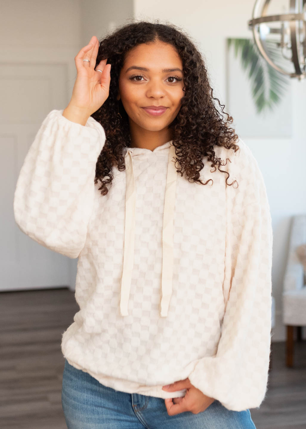 Ivory fuzzy checkered sweater with long sleeves