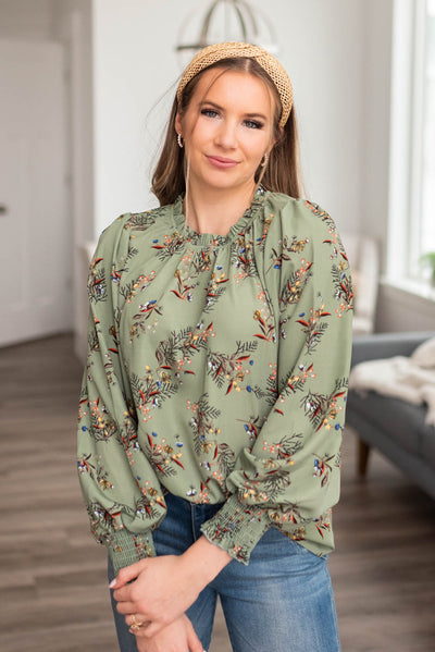 Sage floral blouse with ruffle around the neck