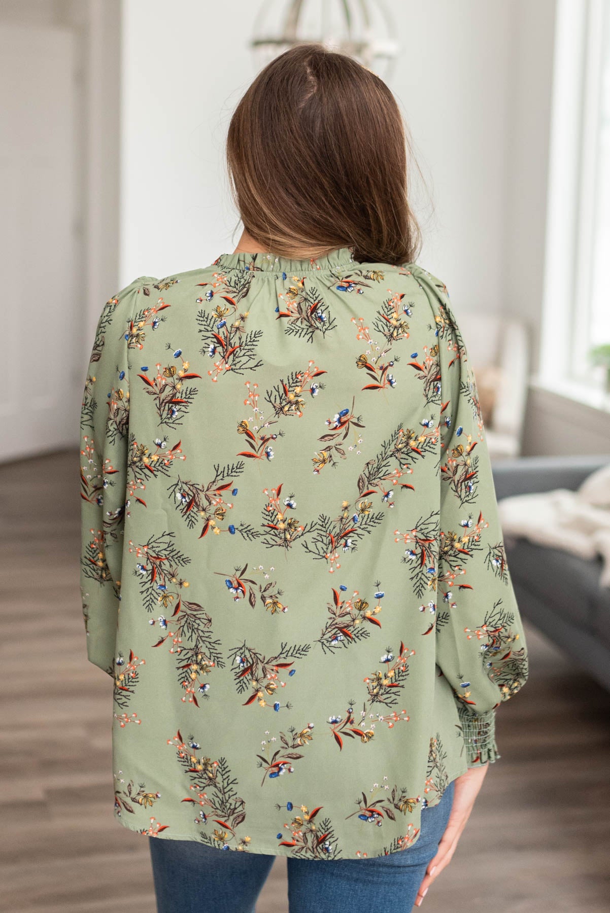 Back view of the sage floral blouse