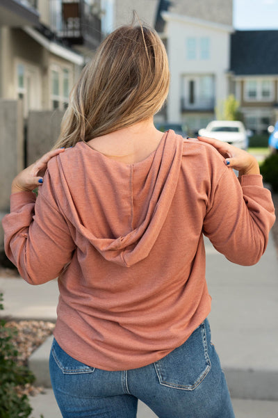 Back view of a brick hoodie