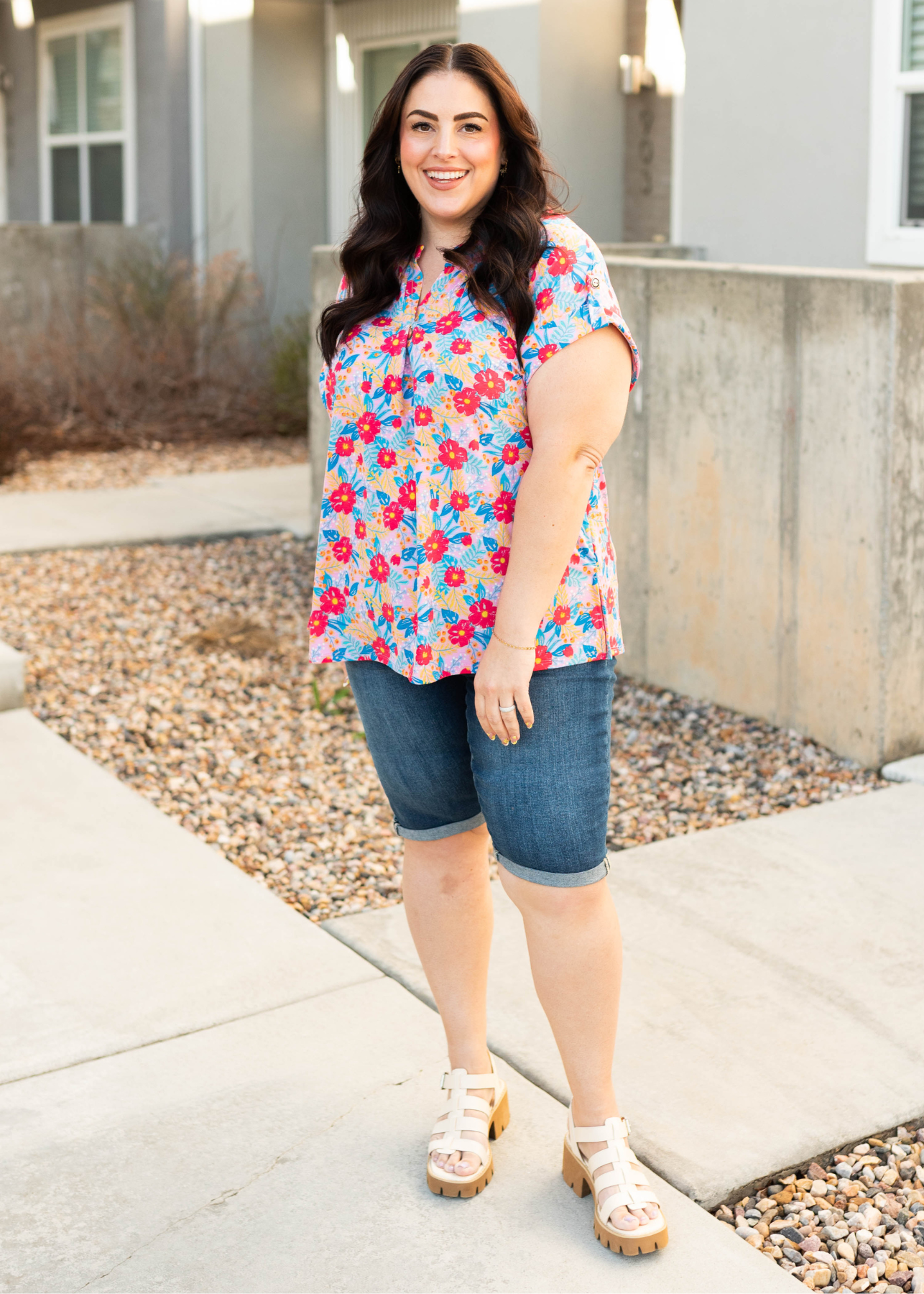 Front view of the plus size blush multi floral top