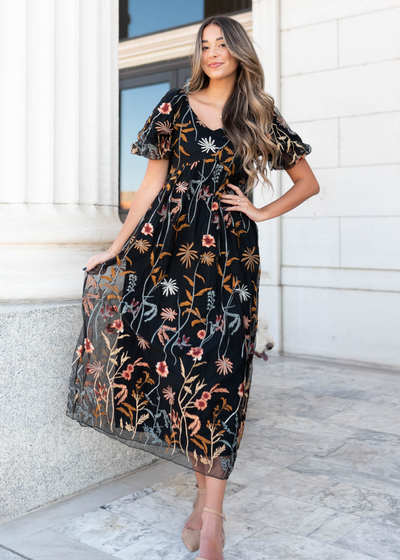 Black embroidered dress with short sleeves