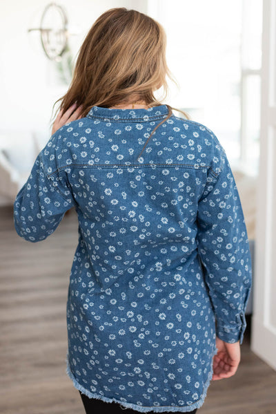 Back view of a denim blue button down top
