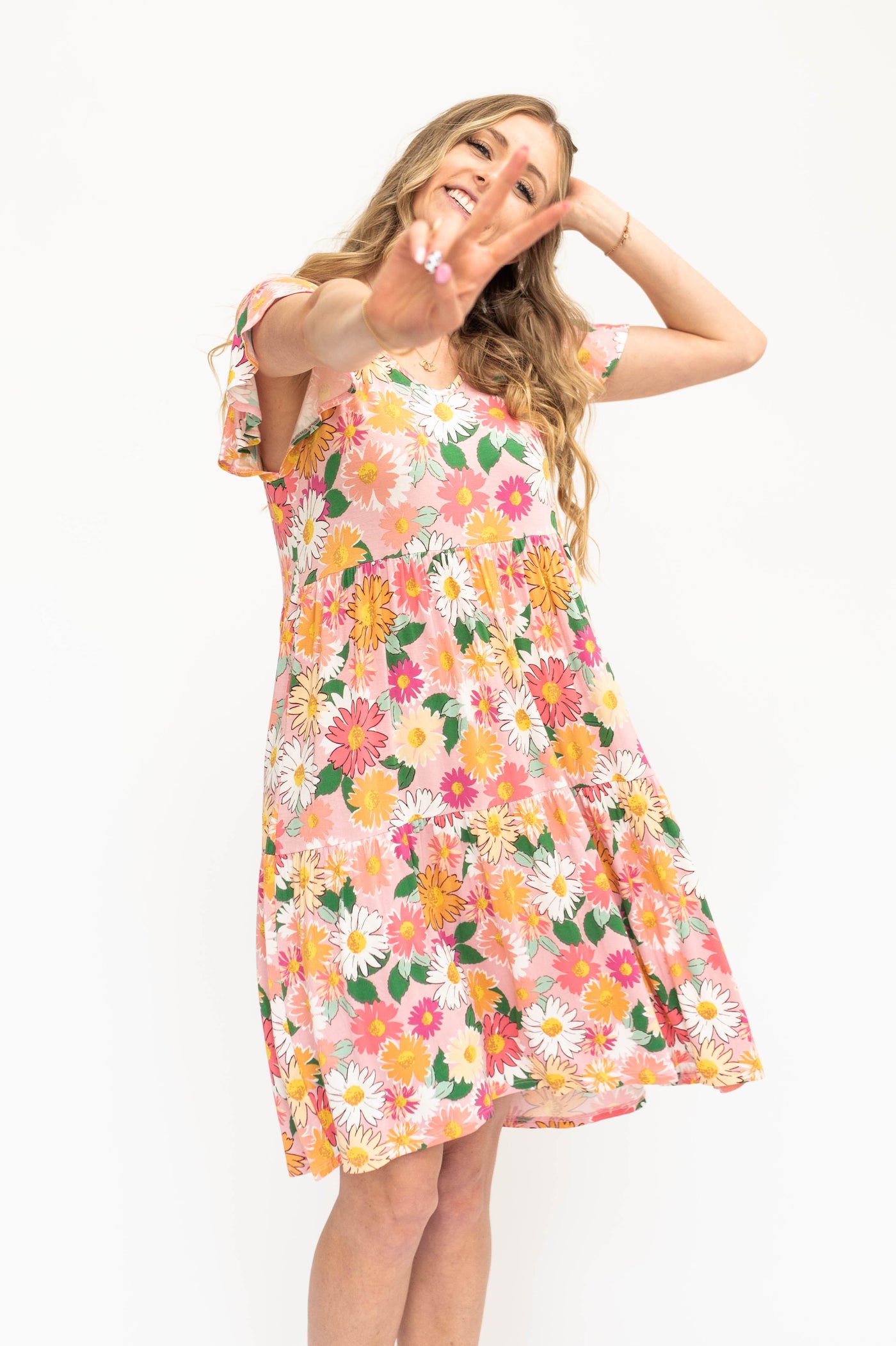 Short sleeve pink floral dress with tiered skirt