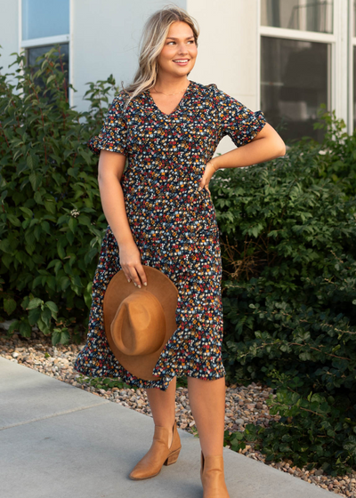 Short sleeve navy floral dress with a v-neck