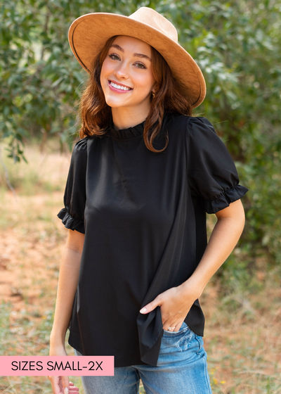 Short sleeve black top with ruffle around the neck