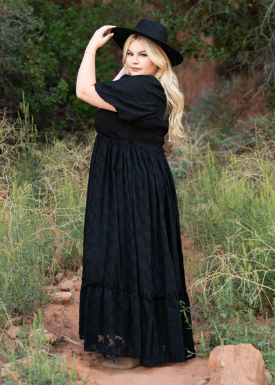 side view of a long black dress