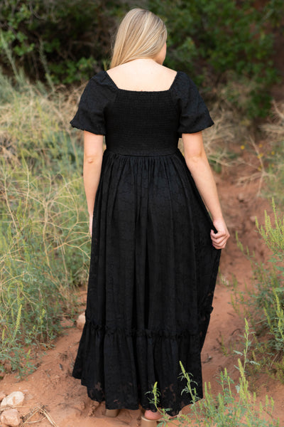 Back view of a long black dress