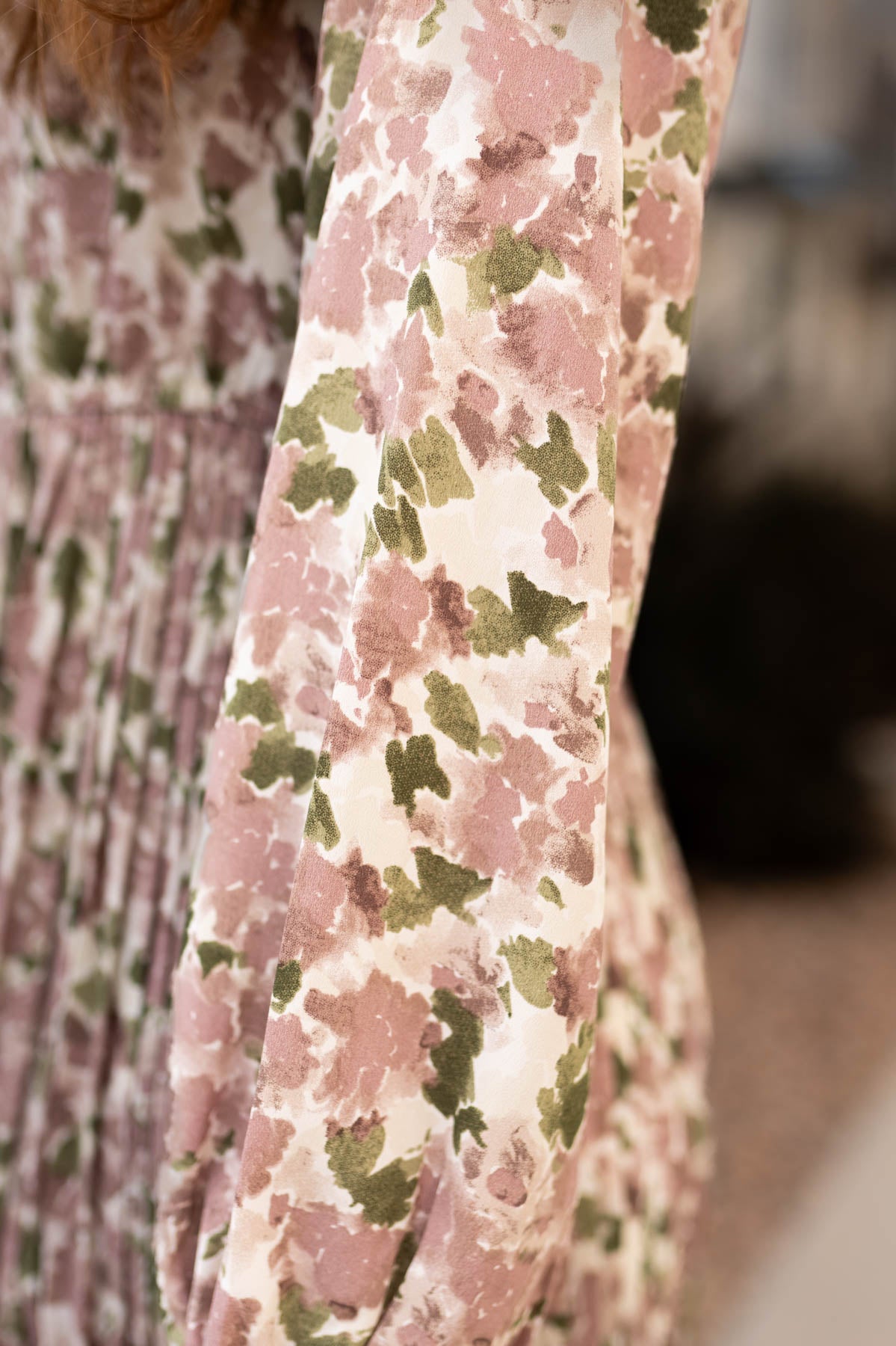Close up of the fabric on a mauve floral dress
