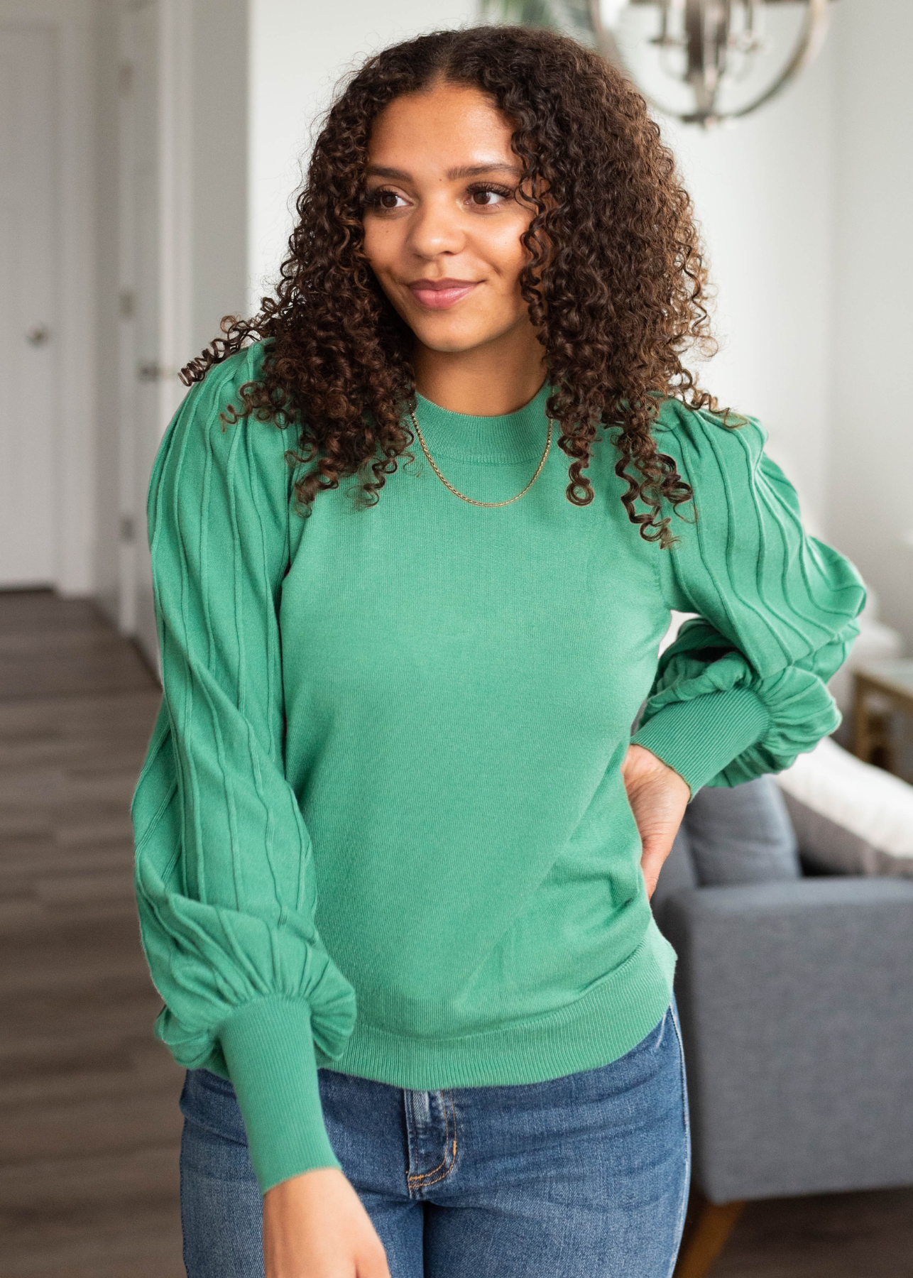 Rosemary green sweater with ribbed sleeves