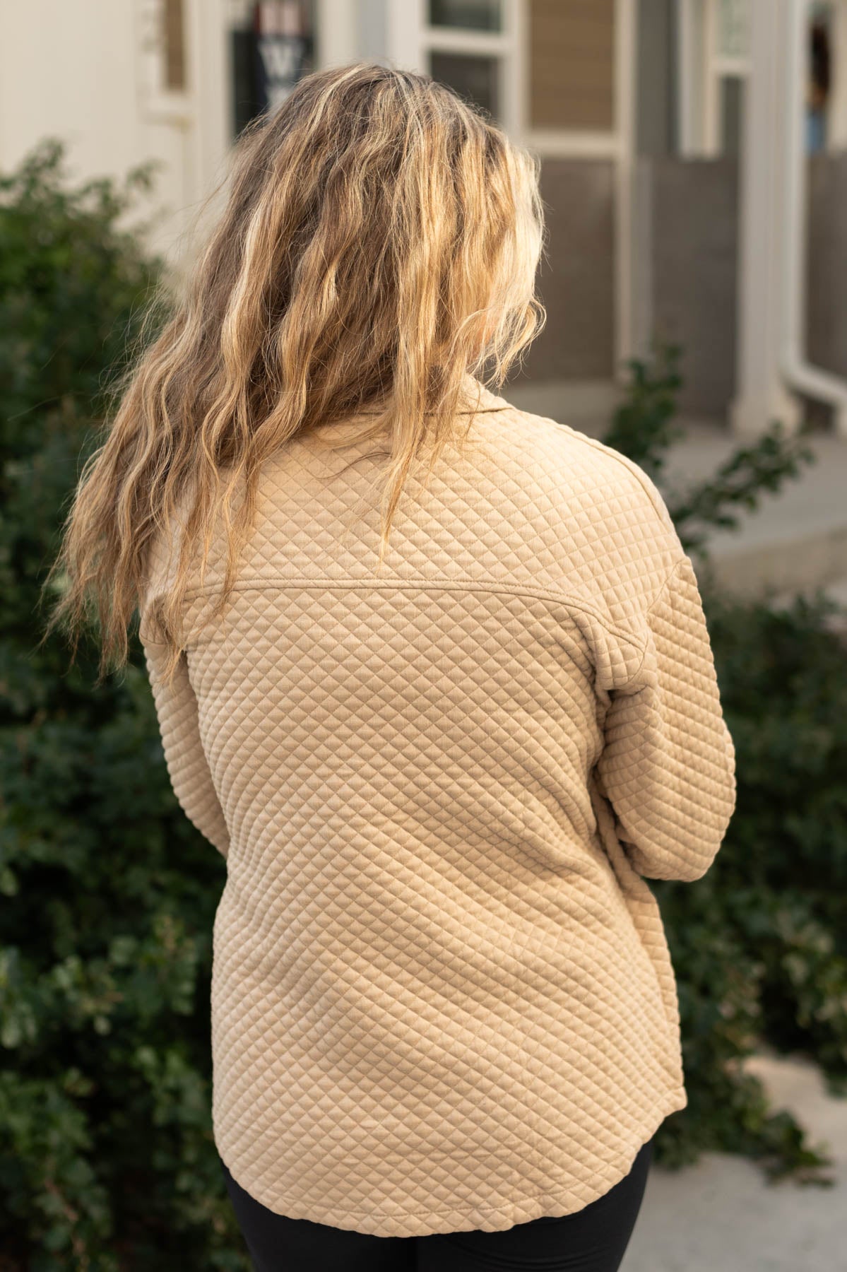 Back view of a khaki retro shacket