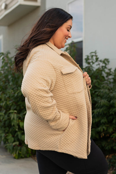 Side view of a plus size khaki retro shacket