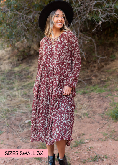 Burgundy floral dress with elastic on the cuffs of the sleeves