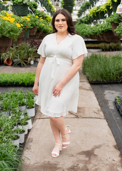 White textured tie dress with a v-neck in plus size