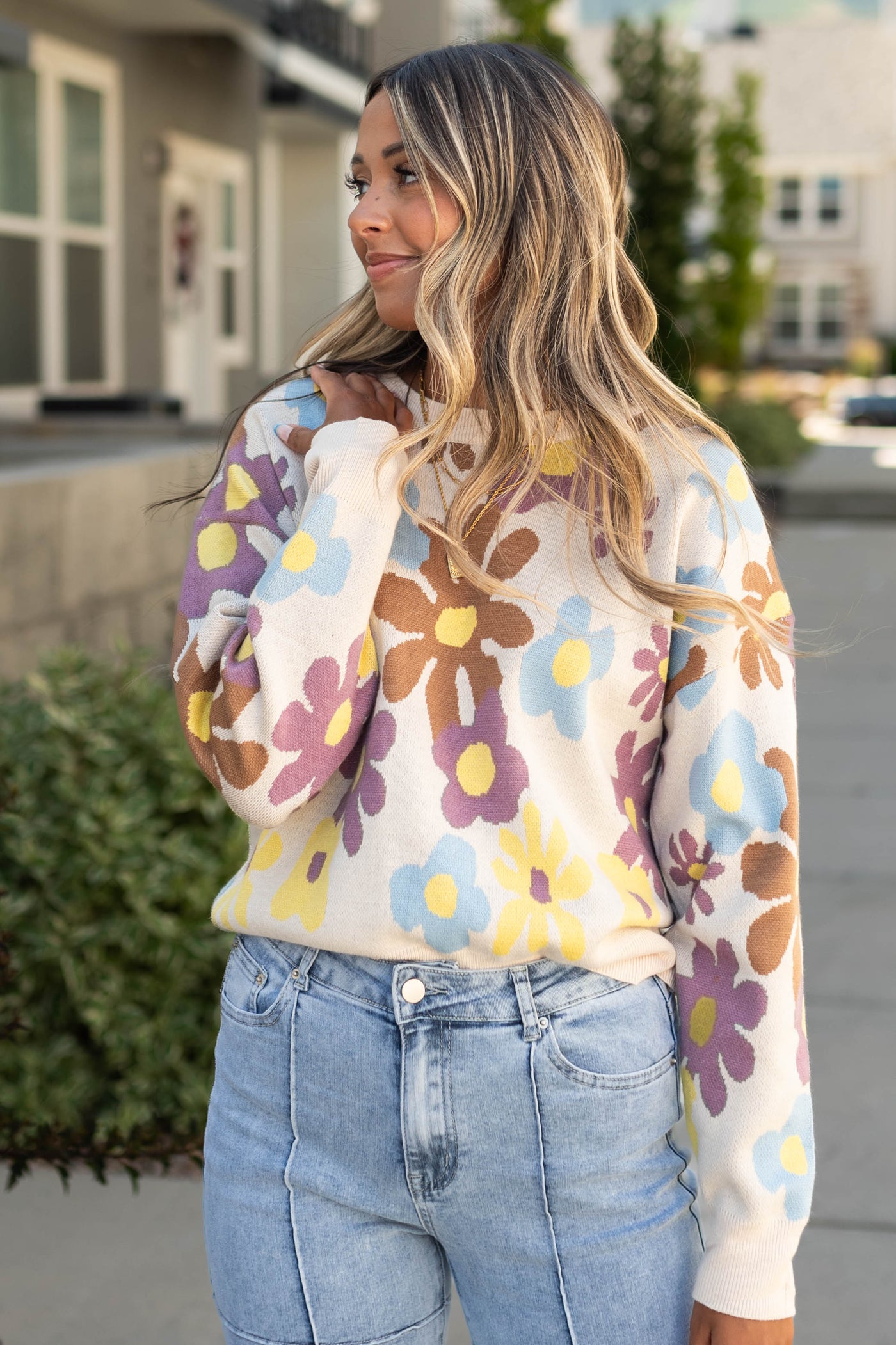 Long sleeve cream sweater with floral print