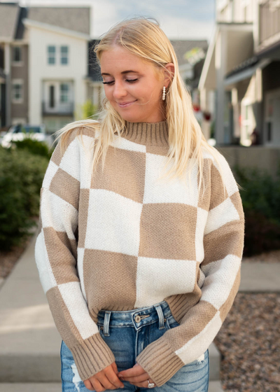 Ivory sweater with tan checkered pattern